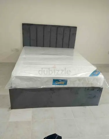 Single bed frame with upholstered headboard and new mattress