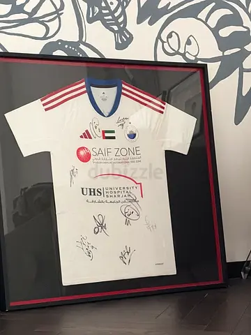 Framed Signed Football Jersey (UAE Team sharjah fc) - Ready to Hang