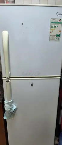 White double-door refrigerator - good working condition