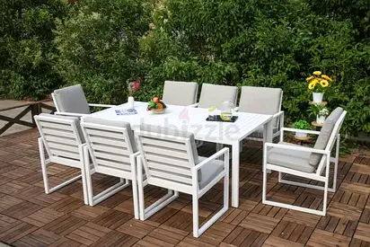 White Outdoor Dining Table with 8 Cushioned Chairs - no negotiations.