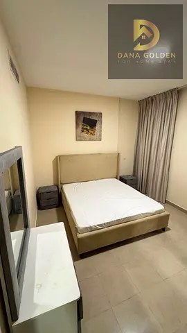 One-bedroom apartment with a living room for rent in Sharjah, Al Majaz 3.