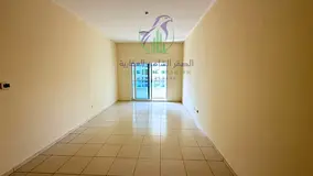 Two-bedroom apartment for annual rent in Al Majaz 3 with free parking, spacious layout, modern finis