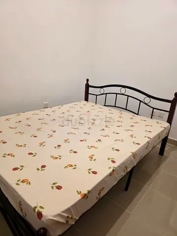 Metal double bed frame with mattress (used) - sturdy simple design