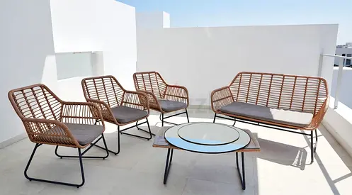Outdoor rattan patio seating set - 3 chairs, 1 loveseat and coffee table