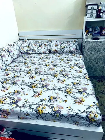 Queen bed frame with floral mattress and headboard - good condition