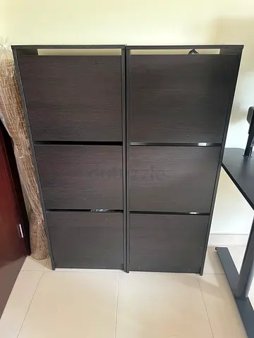 2 IKEA BISSA shoe cabinets with 3 compartments, in black-brown.