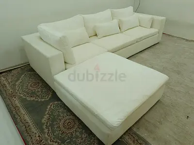 Still brand new condition west elm sofa with footstool