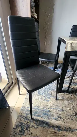 Set of 2 black faux leather dining chairs - good condition