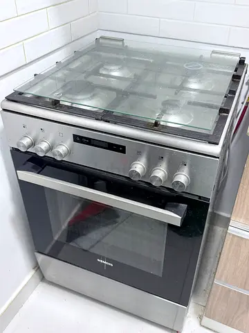 Used freestanding stainless steel gas cooker with oven - good condition