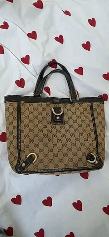 Gucci Pre-owned GG Monogram beige tote bag with dark brown trim