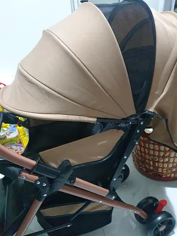 Lightweight beige baby stroller - good condition