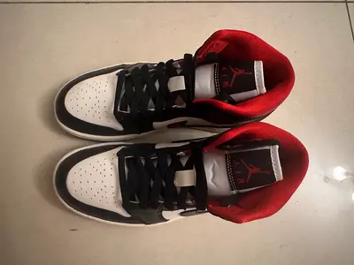 Air Jordan 1 Mid sneakers (resembling the "Gym Red / Black Toe"