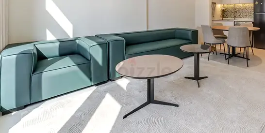 Modern modular green leather sofa set - coffee tables sold separately