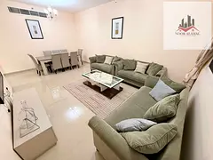 Sharjah Al Taawun, two-bedroom apartment with living room, kitchen, and two bathrooms