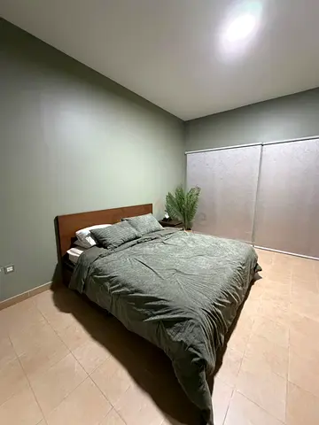 Bedroom with wardrobe and dressers