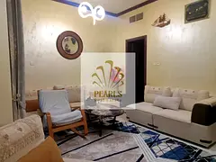Freehold, inheritable property in Al Khor Towers: 2 bedrooms, a living room, a maid's room, and 4 ba
