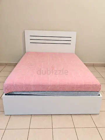 White IKEA queen bed frame - mattress excluded