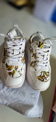 Versace Couture sneakers authentic from ounass Dubai, gently used