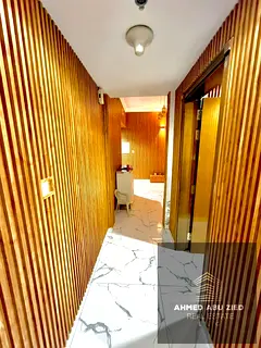 Two-bedroom apartment with a living room for rent in Al-Bayt Towers (Al-Waha); price is 50,000, paya