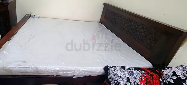 Solid wooden double bed frame with mattress and dressing table - good condition