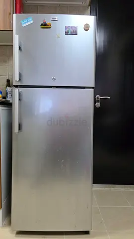 Silver Double-Door Refrigerator - Good Working Condition