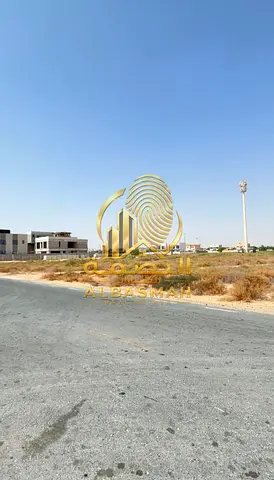Residential land for sale in Al Raqibah, Sharjah; prime location facing the Nesma project.