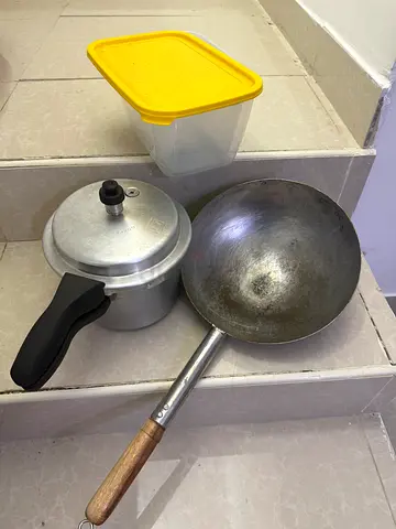 Wok, pressure cooker and storage container — used kitchen set