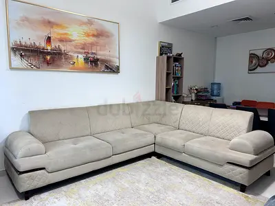 Beige Couch with wood touch