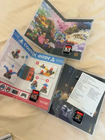 Collection of Nintendo Switch Game Cartridges with Original Inserts and Cases