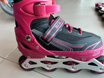 Pink adjustable inline rollerblades - size adjustable, good condition large 39-42