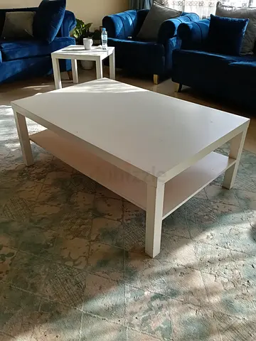 White rectangular coffee table with lower shelf - good condition