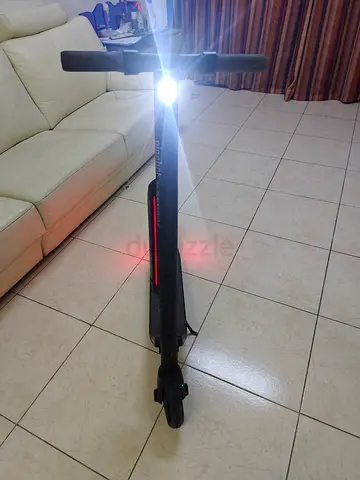 Ninebot Electric scooter 25 km rang condition 6 month use wed original charger Location sharjah