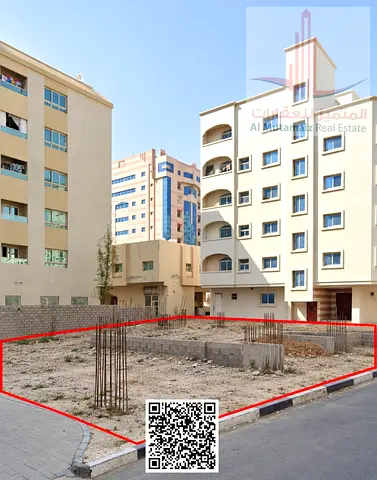Investment Land for Sale in Al Rashidiya 3 Ajman Direct from Owner Corner on Two Roads 587 SQM G+8 with Foundations Ready for Construction Near Amina