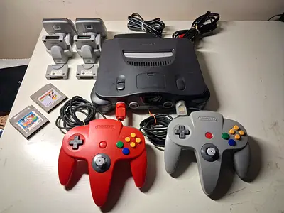 Nintendo 64 console bundle with 2 controllers, memory paks & games 110v