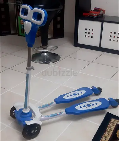 Blue three-wheeled kids scooter (dual-deck) - good condition