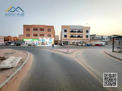 Golden investment opportunity in Al Mowaihat 2, residential commercial villa land of 450 square meters on a main road with freehold ownership for all