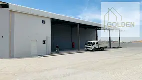 Warehouse for Rent in Umm Al Quwain with a total area of 7,500 sq ft, including an open shed with th