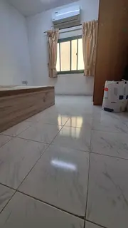 A fully furnished room in a 2BHK with kitchen facility near clocktower Sharjah