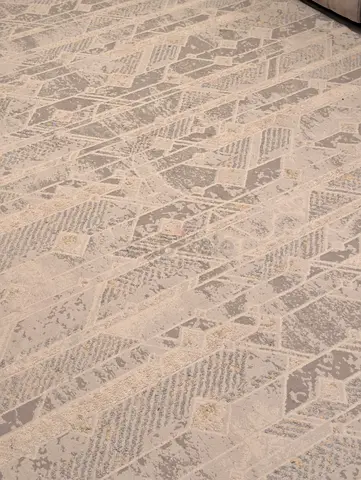 Light grey geometric abstract area rug - good condition