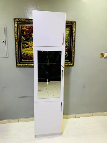 Tall white storage cabinet with mirror - slim wardrobe / bathroom cabinet