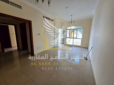 Spacious one-bedroom apartment with a living room for rent in Al Qulay'ah; Features central air conditioning, two bathrooms, modern finishing, and an