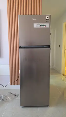 Tall stainless steel fridge-freezer (bottom fridge) - good working condition