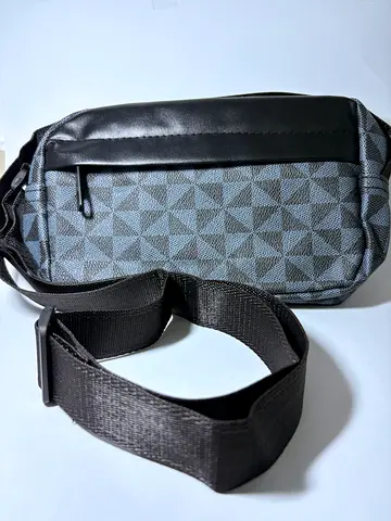 Compact grey patterned sling bag with adjustable strap