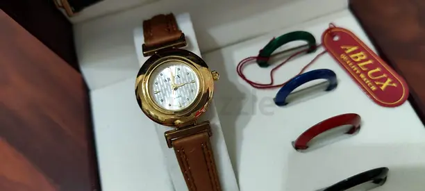 Ablux Women's Gold-Tone Watch with Interchangeable Color Bezels, Brown Leather Strap