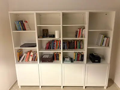 Custom IKEA Besta Shelving system. 4-section bookcase with Hanvikenlower cabinets - great condition