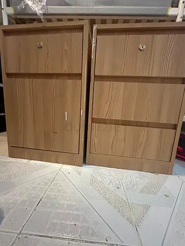 Pair of light wood bedside cabinets / small storage cabinets - good condition