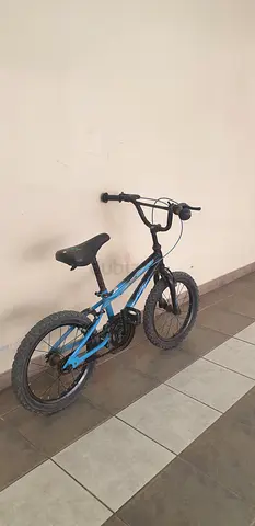 Blue kids bicycle, good condition, 16-inch wheels negotiable