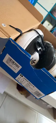 Adidas black & white sneakers in original box — lightly used