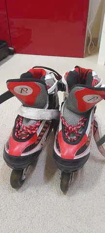 Pair of adult inline rollerblades (size not marked) - good condition