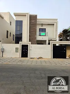 Spacious villa for rent in Al Yasmeen, Ajman, featuring 5 bedrooms, a majlis, a living room, and par